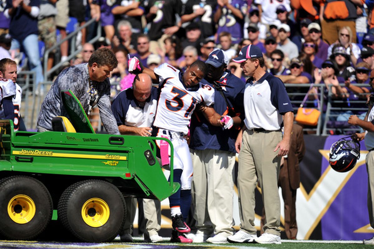 BALTIMORE, MD - OCTOBER 10:  Darcel McBath #31 of the Denver Broncos is carted off the field after being injured during the game against the Baltimore Ravens. (Photo by Larry French/Getty Images)