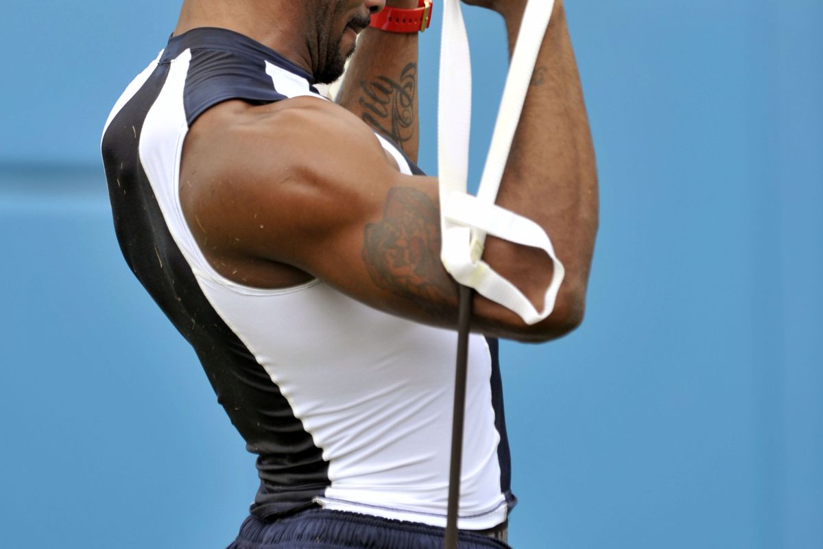Aug 4, 2012; Nashville, TN, USA; Tennessee Titans player Kenny Britt works out on the sideline during training camp workout at LP Field. Mandatory Credit: Jim Brown-US PRESSWIRE