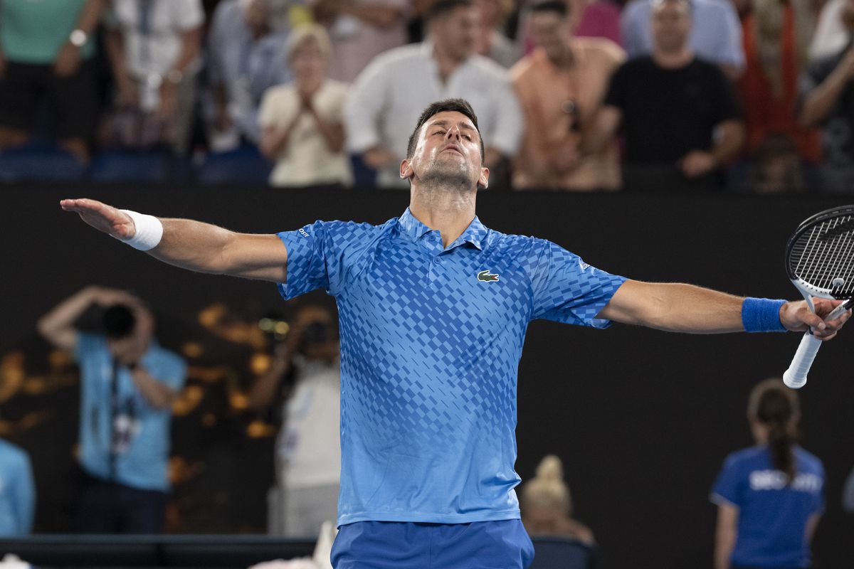 Novak Djokovic of Serbia celebrates winning in the Semifinal singles match against Tommy Paul of the United States during day twelve of the 2023 Australian Open at Melbourne Park on January 27, 2023 in Melbourne, Australia.