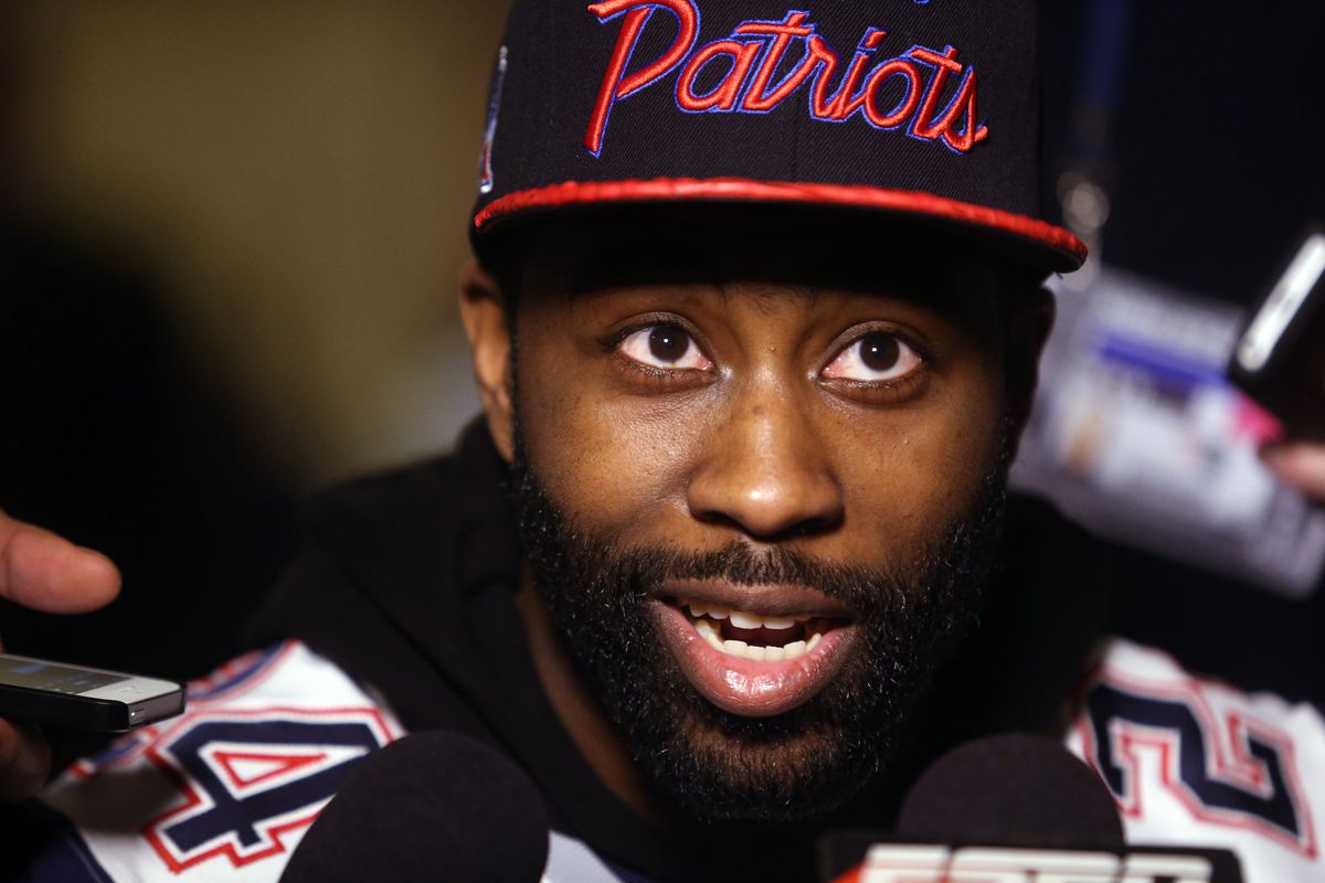 You do know that you look good wearing Patriots gear, Darrelle?