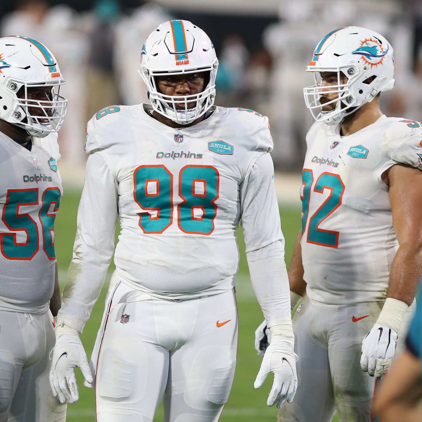 Miami Dolphins defensive tackle Raekwon Davis (98) lines up during