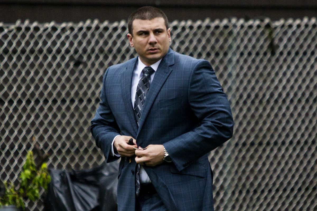 Former NYPD officer Daniel Pantaleo in a suit on his way to his administrative trial.
