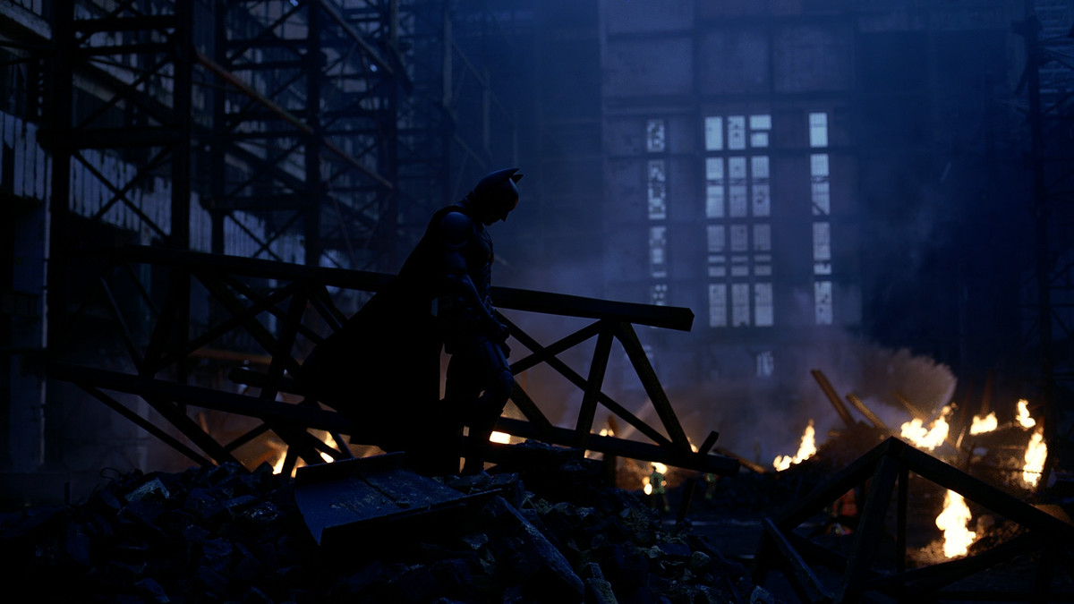 The Dark Knight - Batman standing in flames