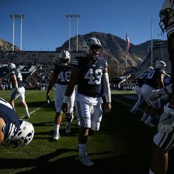 Brigham Young University players warm up before a game against the UMass Minutemen at LaVell Edwards Stadium in Provo on Saturday, Nov. 19, 2016.