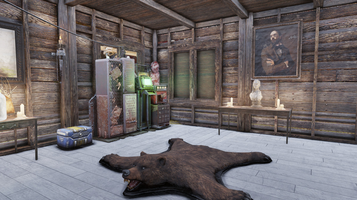 Fallout 76 - a player’s CAMP, with a vendor station, bear rug, bust, candles, and intimidating portrait.
