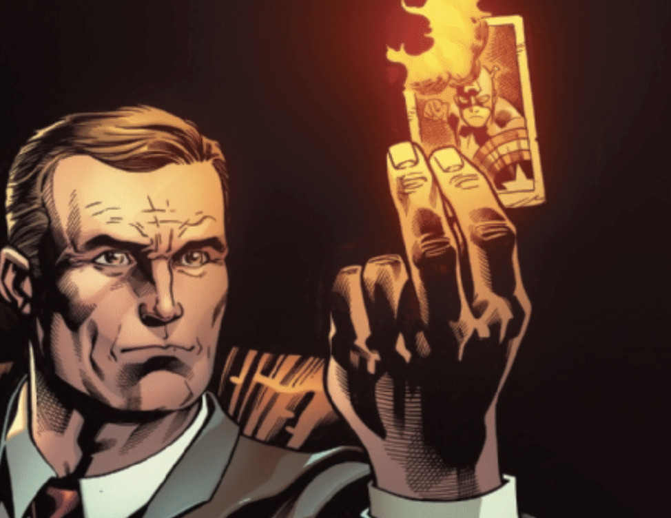 Avengers #11 - Agent Coulson holding up a burning Captain America card