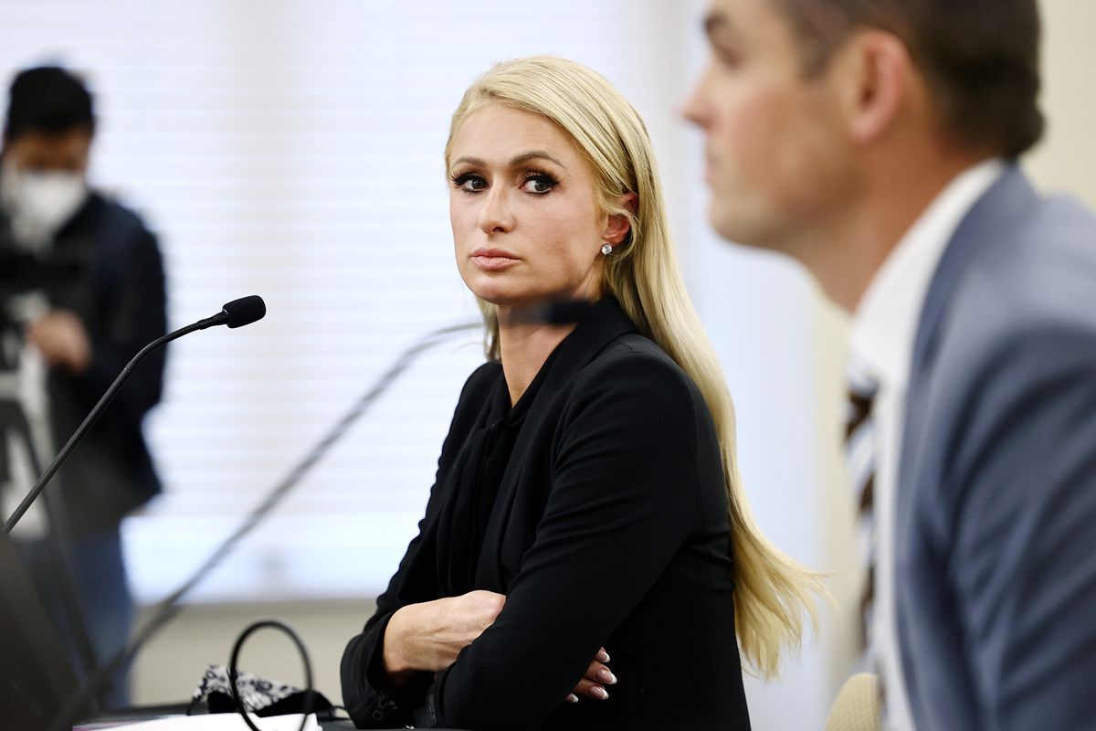 Paris Hilton looks over at Sen. Mike McKell, R-Spanish Fork, as they testify about SB127 before the Senate Judiciary, Law Enforcement and Criminal Justice Committee at the Capitol in Salt Lake City on Monday, Feb. 8, 2021. The bill, sponsored by McKell, would better regulate centers for troubled teens.