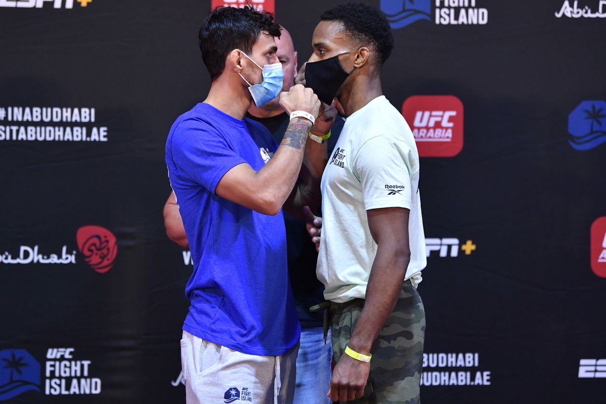 Opponents Ricardo Ramos of Brazil and Lerone Murphy of England face off during the UFC Fight Night weigh-in inside Flash Forum on UFC Fight Island on July 14, 2020 in Yas Island, Abu Dhabi, United Arab Emirates.