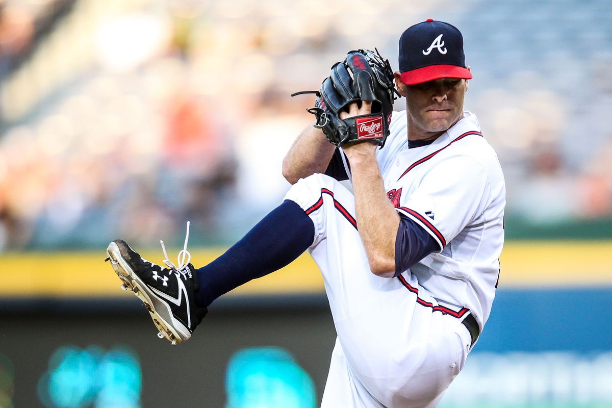 August 14, 2012; Atlanta, GA, USA; Atlanta Braves starting pitcher Tim Hudson (15) pitches in the second inning against the San Diego Padres at Turner field. Mandatory Credit: Daniel Shirey-US PRESSWIRE