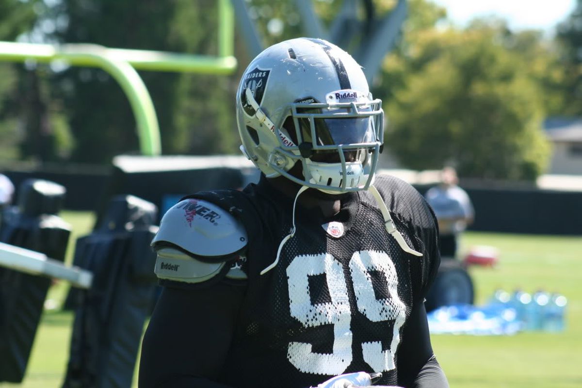 Oakland Raiders defensive end Lamarr Houston at training camp 2011 (photo by Levi Damien)