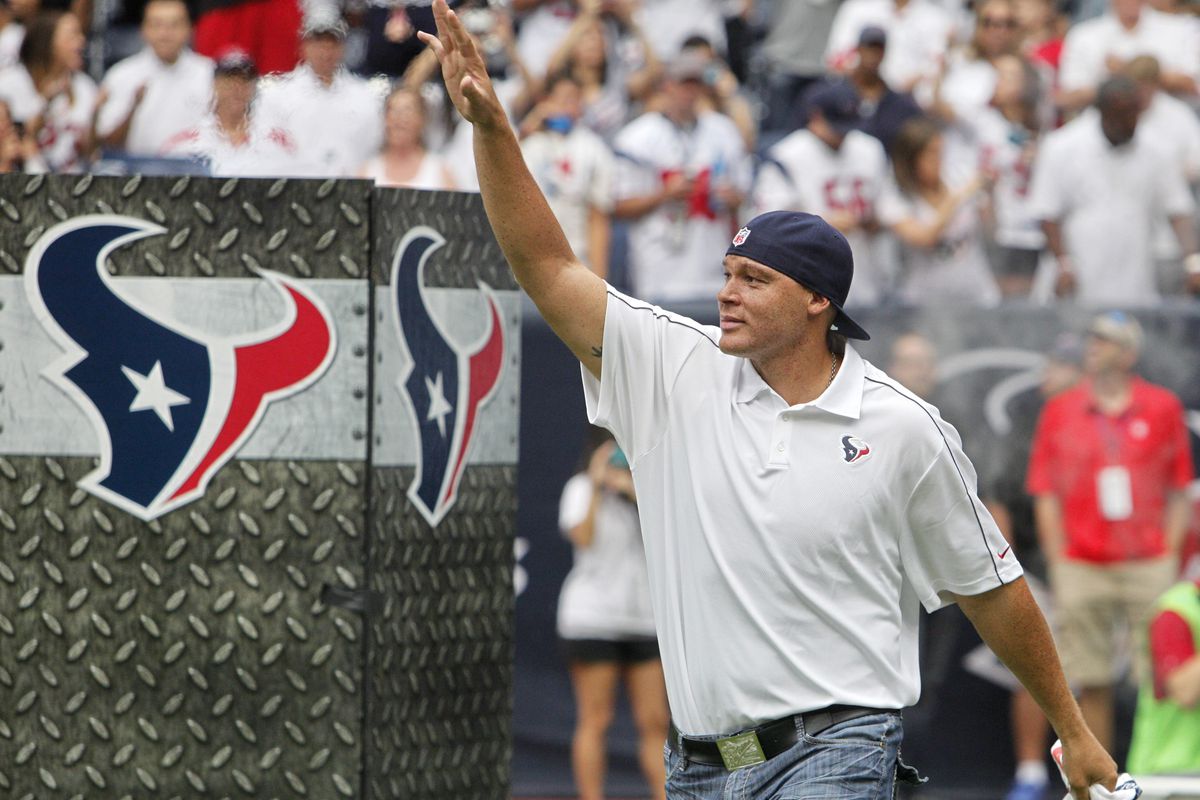 HOUSTON,TX - SEPTEMBER 09: Former Houston Texan Billy Miller waves to the crowd before the Houston Texans played the Miami Dolphins during the season opener at Reliant Stadium on September 9, 2012 in Houston, Texas.  (Photo by Bob Levey/Getty Images)