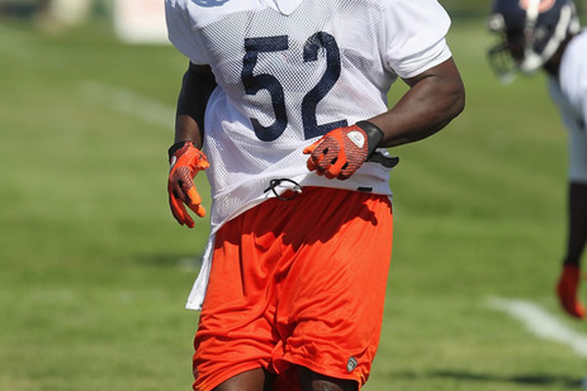 BOURBONNAIS, IL - JULY 30: J.T. Thomas #52 of the Chicago Bears works out during a summer training camp practice at Olivet Nazarene University on July 30, 2011 in Bourbonnais, Illinois. (Photo by Jonathan Daniel/Getty Images)