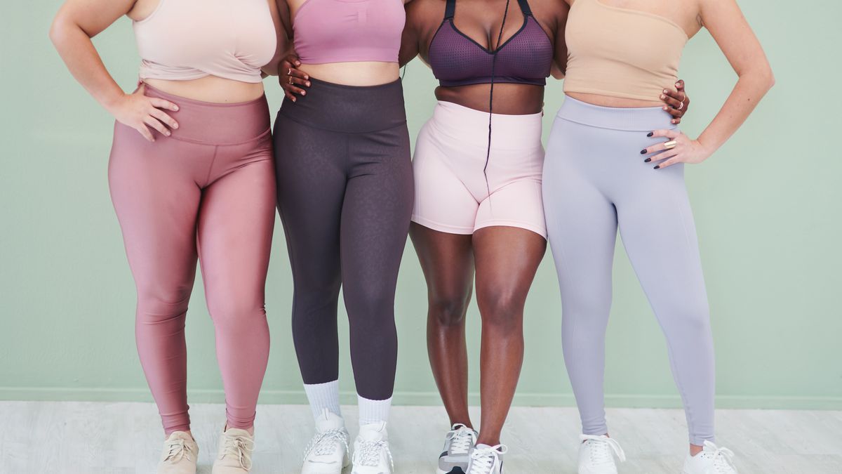 Four women of varying sizes and statures, photographed from the neck down, posing in pastel-colored athleisure outfits.