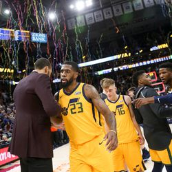 Utah Jazz center Rudy Gobert (27) and forward Royce O'Neale (23) embrace as the Jazz celebrate their 106-77 win over the Denver Nuggets at Vivint Smart Home Arena in Salt Lake City on Tuesday, Nov. 28, 2017.