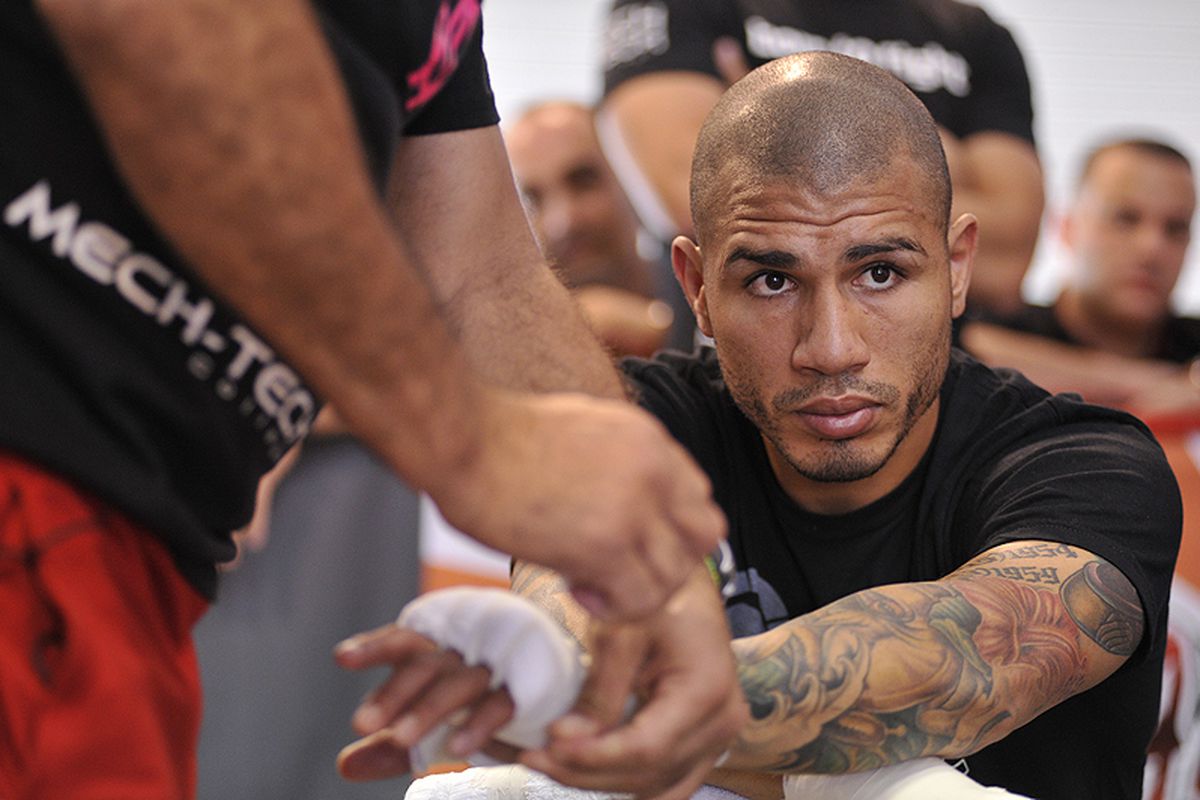 Miguel Cotto and trainer Pedro Diaz are working on the plan to topple Floyd Mayweather on May 5. (Photo by Octavian Cantilli - Hoganphotos/Golden Boy Promotions)