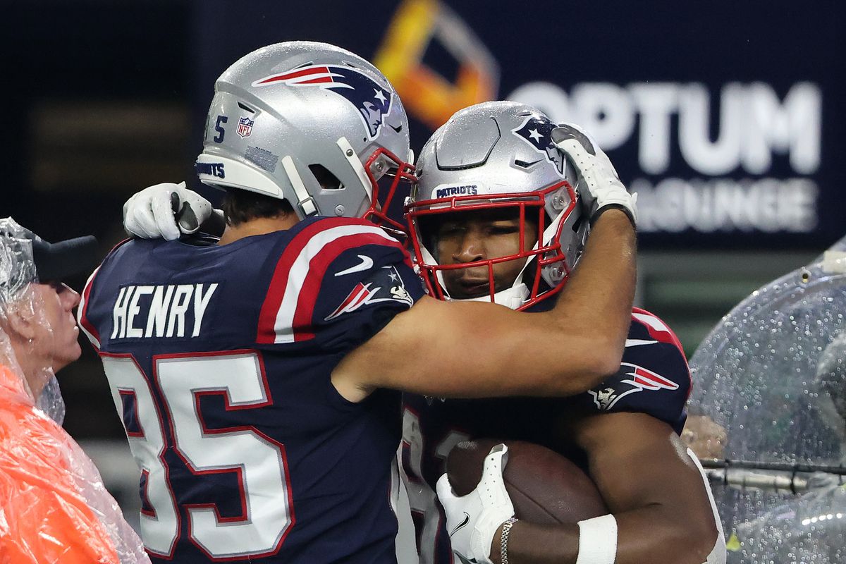 Foxborough, MA - October 3: Hunter Henry (left) congratulates Jonnu Smith after Smith made a touchdown in the fourth quarter. The New England Patriots host the Tampa Bay Buccaneers in a regular season NFL game at Gillette Stadium in Foxborough, MA on Sunday, Oct. 3, 2021.