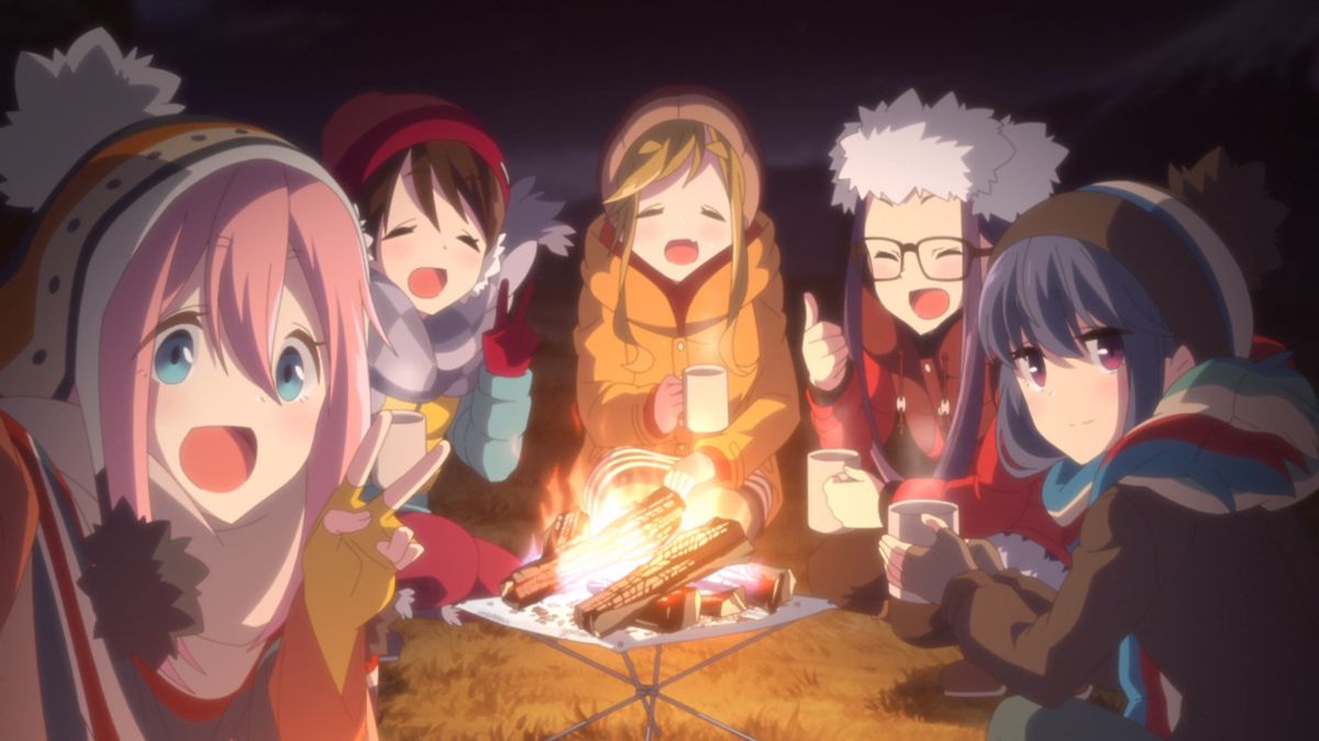 The girls of Laid-Back Camp chilling by the fire