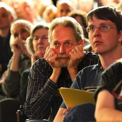 Bob Nelson leans on his hands as he and several hundred Utahns gather at the University of Utah to voice their opinions  of the proposed Public Lands Initiative Wednesday, March 2, 2016. 
