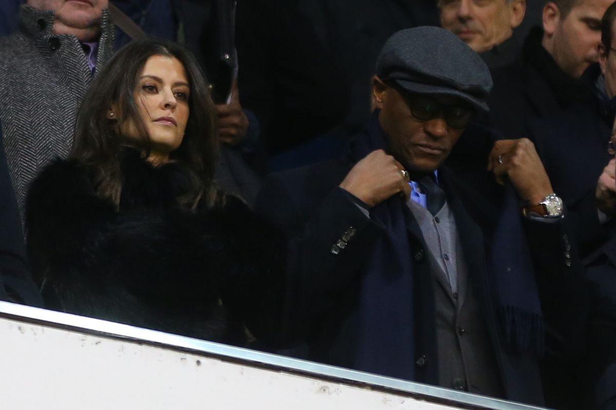 LONDON, ENGLAND - JANUARY 04: Chairman of Chelsea Bruce Buck stands with Club director Marina Granovskaia and technical director Michael Emenalo during the Premier League match between Tottenham Hotspur and Chelsea at White Hart Lane on January 4, 2017 in London, England. 
