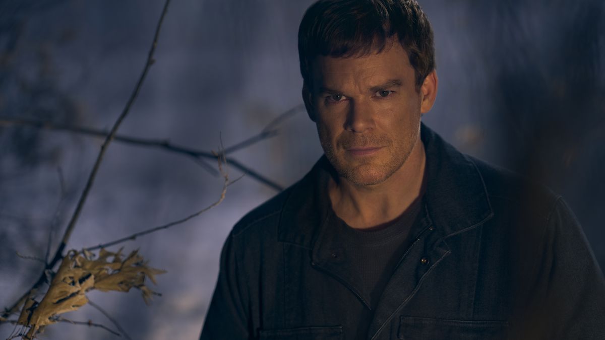 Dexter Morgan stands in a dark cloak in the snowy woods in Showtime’s Dexter: New Blood