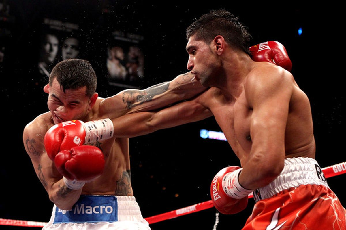 Amir Khan survived the challenge from Marcos Maidana in Las Vegas -- barely. (Photo by Scott Heavey/Getty Images)