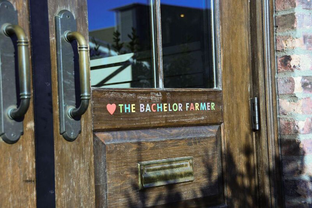The front door of The Bachelor Farmer, the multicolored name with a signature heart