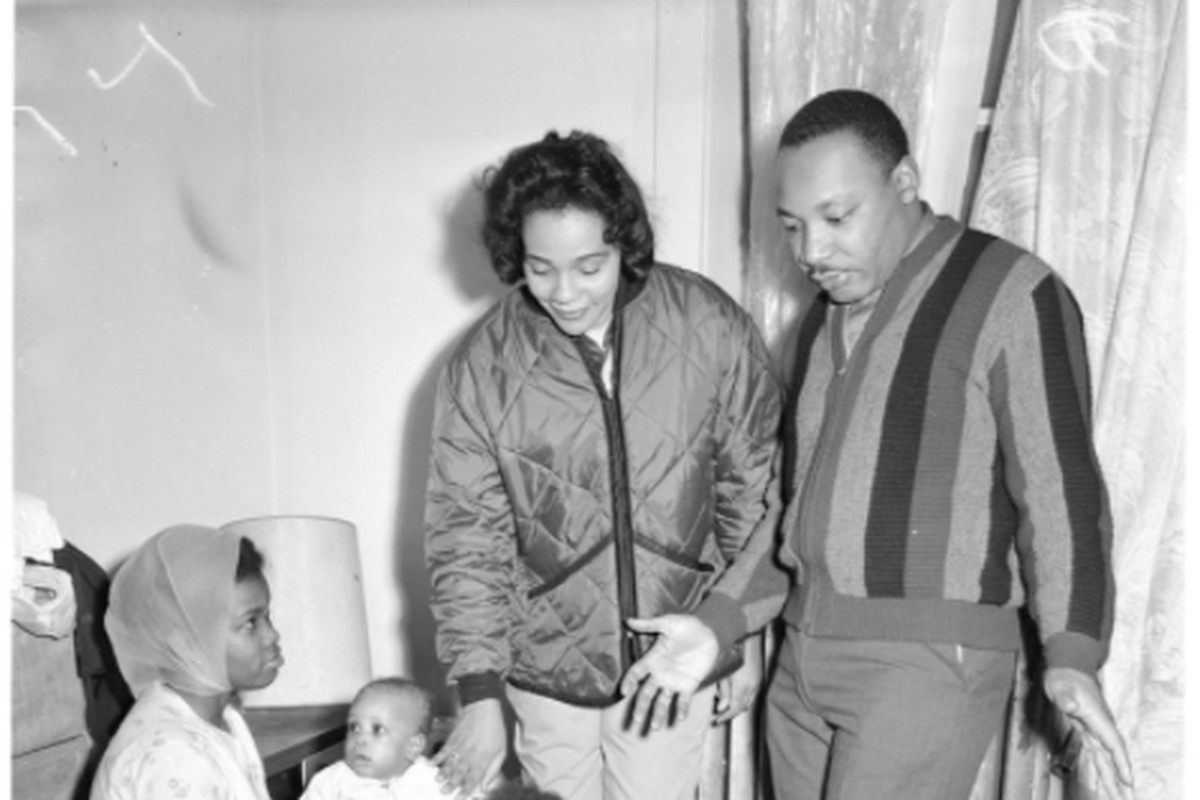 Dr. Martin Luther King Jr. and Coretta Scott King visit tenants of a deteriorating apartment in Chicago