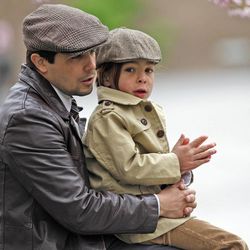 Javier Jimenez and his son, Esteban, enjoy listening to conference outside during The Church of Jesus Christ of Latter-day Saints' Saturday afternoon session of the 183rd Annual General Conference Saturday, April 6, 2013, in Salt Lake City.