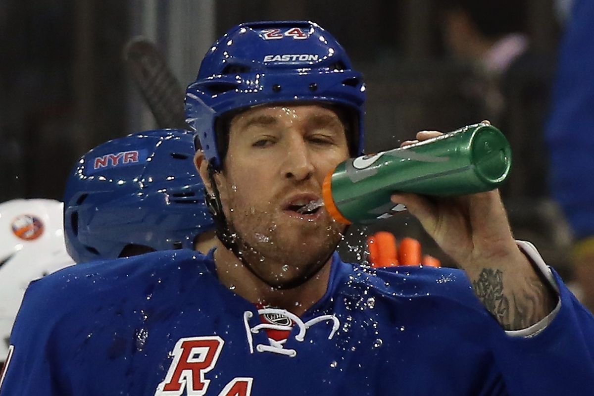 NEW YORK, NY - OCTOBER 14: Ryan Malone #24 of the New York Rangers takes a drink prior to playing in his first game as a New York Rangers against the New York Islanders at Madison Square Garden on October 14, 2014 in New York City.  (Photo by Bruce Bennett/Getty Images)