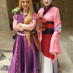 Hannah Oberle and Addison Oberle pose dressed as Disney princesses during the FanX Salt Lake Comic Convention press conference on Wednesday, April 11, 2018, at the Utah State Capitol.