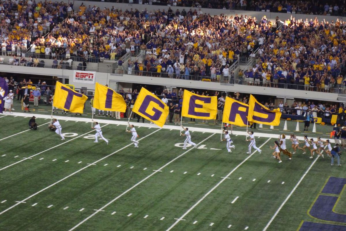 Relive LSU and Oregon in the "Cowboys Classic" with a photo essay from the scene. How insane is Cowboys stadium? What's the best way to spice up a parking lot tailgate? Who had the best sign? And how depressed were Oregon fans?