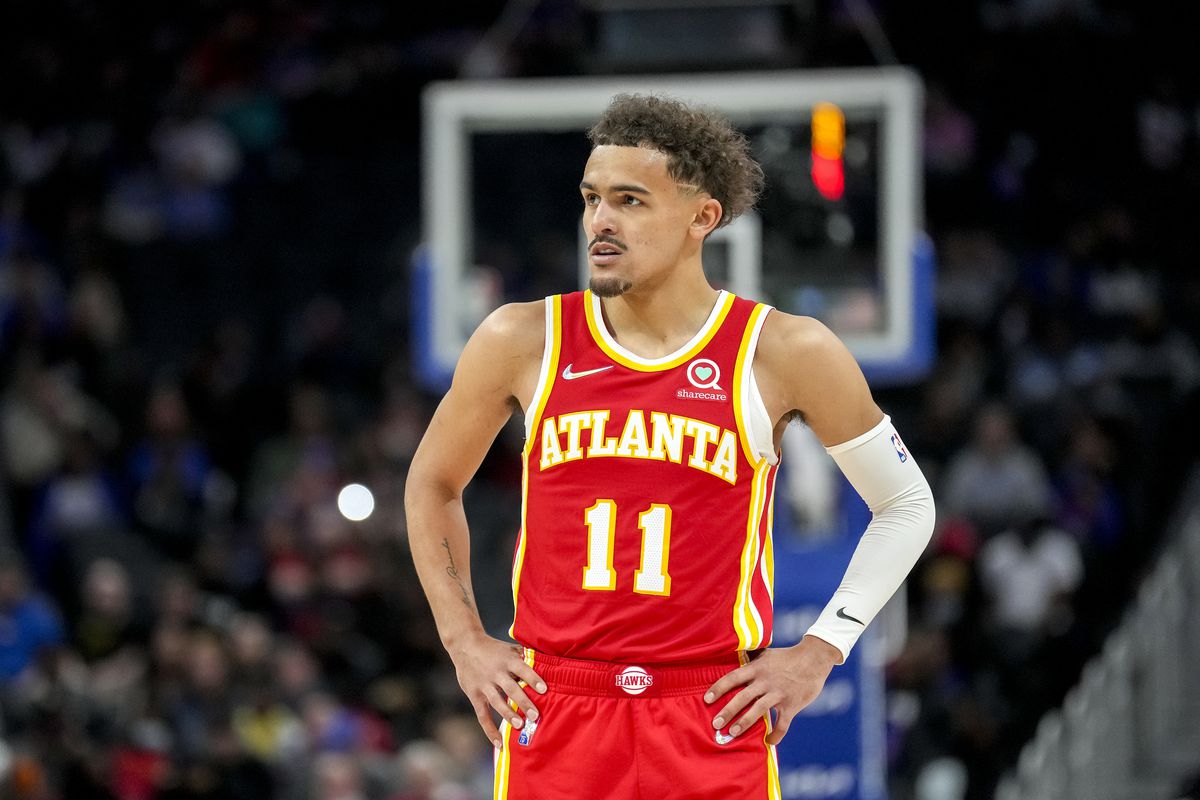Trae Young #11 of the Atlanta Hawks looks on against the Detroit Pistons during the third quarter at Little Caesars Arena on March 23, 2022 in Detroit, Michigan.