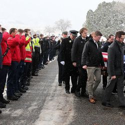 Pallbearers carry Jake Shepherd's casket during graveside services in Mendon on Monday, Nov. 28, 2016. Shepherd was one of three crew members of a medical aircraft that crashed just after takeoff on Nov. 18 while transporting a patient from Elko, Nevada, to University Hospital in Salt Lake City. All four people died in the crash.