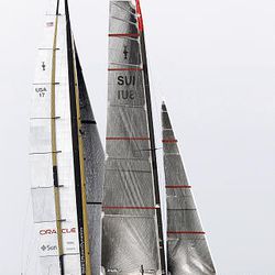 American challenger BMW Oracle BOR 90, left, sails during  the second race of the 33rd America's Cup against Swiss defender Alinghi 5, no picture, of Valencia, Spain, Sunday.