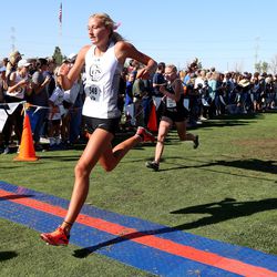 Corner Canyon High School’s Lexi Larsen finishes the BYU Autumn Classic Cross Country Invitational at the East Bay Golf Course Saturday, Sept. 14, 2019 in Provo.
