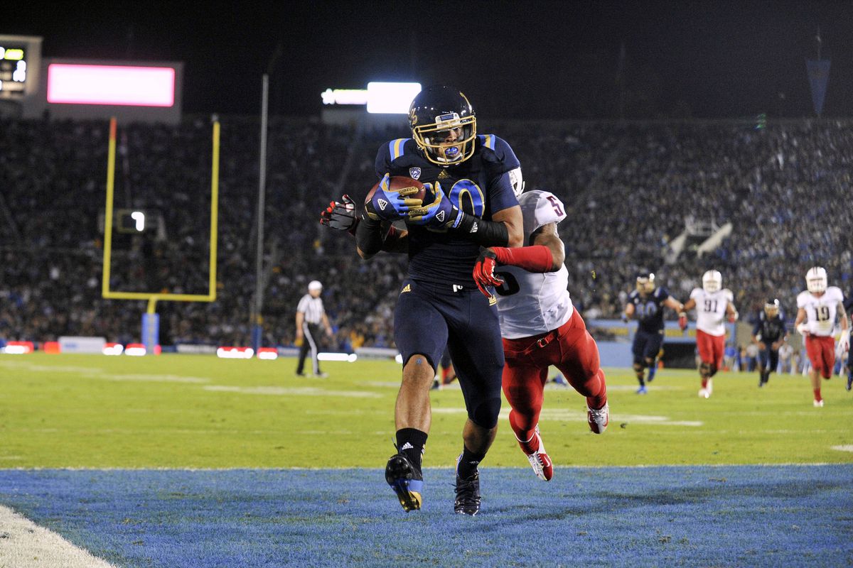 Arizona defender makes a flying tackle on Jordan Payton five yards into the end zone in 2012's blowout UCLA win