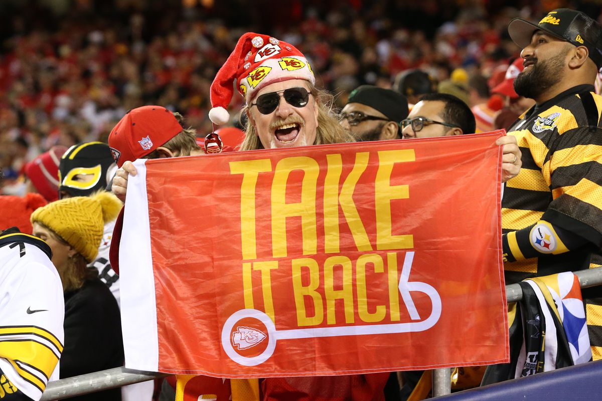 A Kansas City Chiefs fan holds a sign saying Take It Back during an NFL game between the Pittsburgh Steelers and Kansas City Chiefs on Dec 26, 2021 at GEHA Field at Arrowhead Stadium in Kansas City, MO.