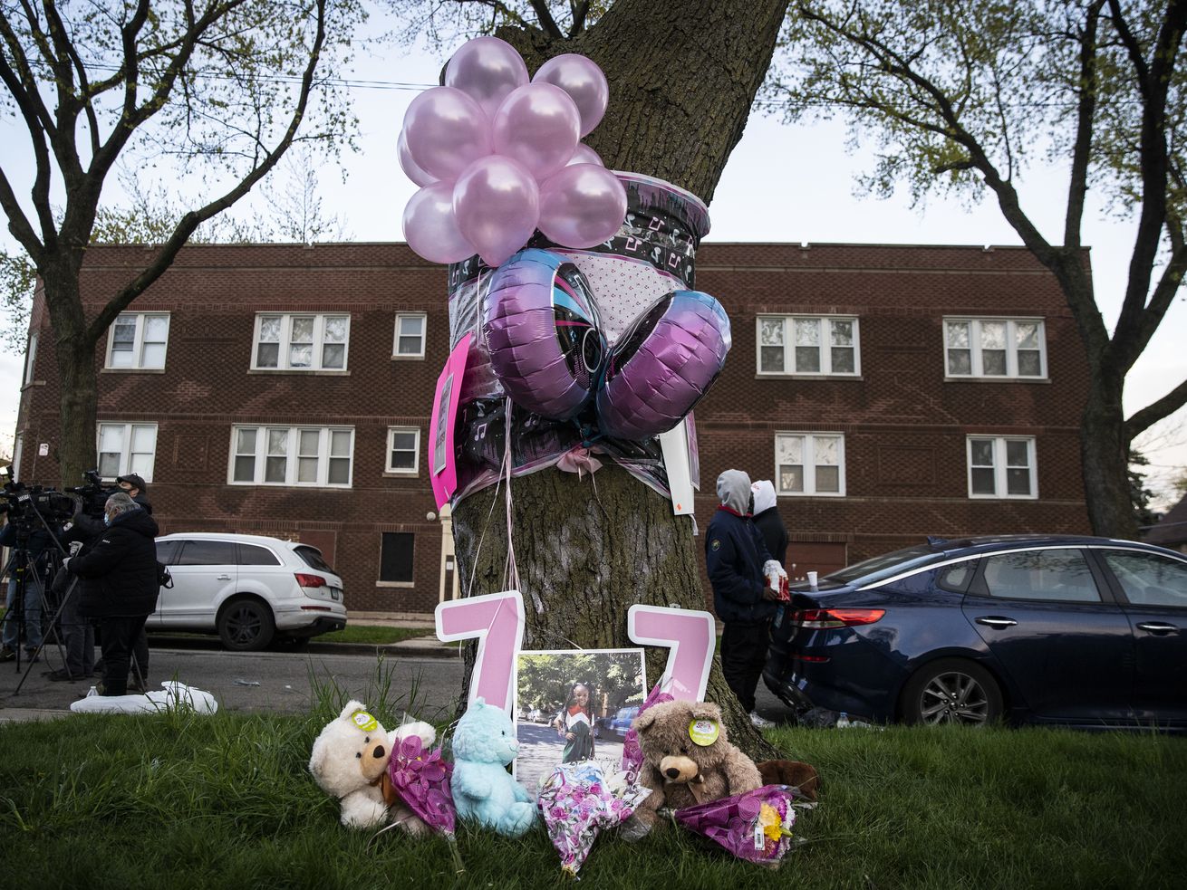 Dozens of family members and supporters of 7-year-old Jaslyn Adams gather for a vigil outside the girl’s grandmother’s West Side home, Wednesday evening, April 21, 2021. Jaslyn was fatally shot Sunday, April 18, while in line at a McDonald’s drive-thru with her father, who suffered one gunshot wound to the back and survived.