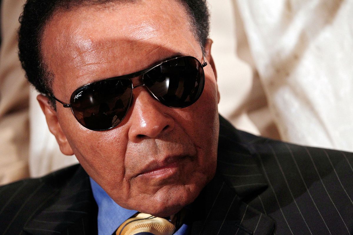 Muhammad Ali is home and recovering after a health scare in November. (Photo by Win McNamee/Getty Images)