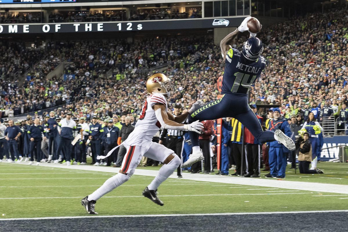 Seattle Seahawks wide receiver D.K. Metcalf catches a pass for a touchdown over San Francisco 49ers cornerback Ahkello Witherspoon during the second half at CenturyLink Field. San Francisco defeated Seattle 26-21