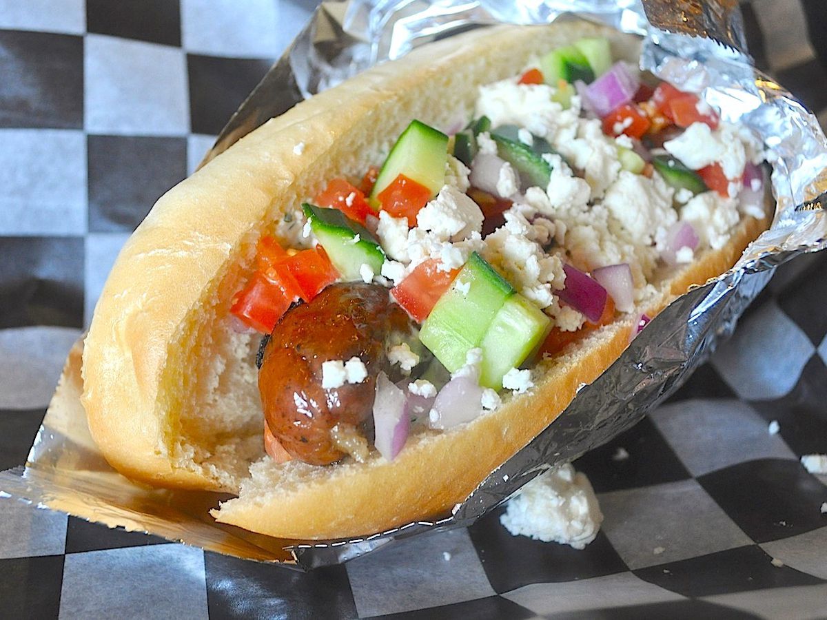 Greek-inspired hot dog with feta and cucumber relish