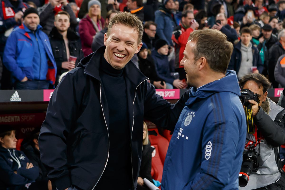 Nagelsmann and Flick share a smile as they talk prior to a February 9 2020 match between their clubs