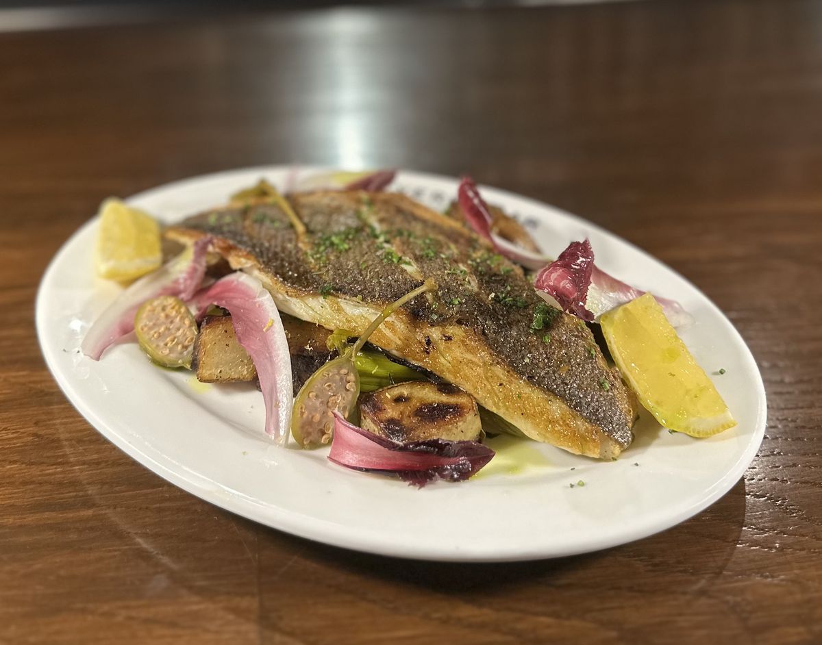 A plate with grilled branzino at the Beverly Bar in Beverly Hills, California.