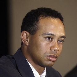 This April 20, 2009, file photo shows Tiger Woods during a news conference about the AT&T National golf tournament he hosts, in Bethesda, Md. Tiger Woods will speak to the media Friday.