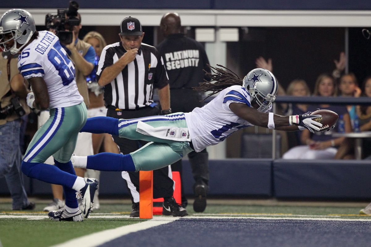 Aug 25, 2012; Arlington, TX, USA; Dallas Cowboys receiver Dwayne Harris (17) dives for a first quarter touchdown against the St Louis Rams in the first quarter at Cowboys Stadium. Mandatory Credit: Matthew Emmons-US PRESSWIRE