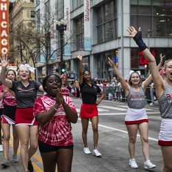 Cheerleaders from Indiana University Northwest march in Columbus Day Parade as it moves down North State Street in the Loop, Monday afternoon, October 11, 2021.