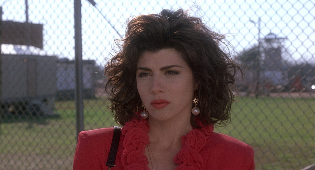 Marisa Tomei in front of a prison yard in My Cousin Vinny