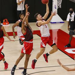 Utah guard Pelle Larsson (3) shoots a layup as the Runnin’ Utes open practice Wednesday, Oct. 14, 2020, at the Utah basketball practice facility in Salt Lake City.