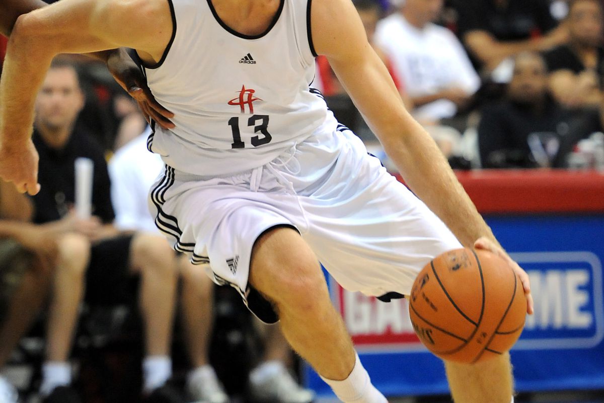 July 18, 2012; Las Vegas, NV, USA;    Houston Rockets guard Zoran Dragic (13) handles the ball during the first half of the game against the Chicago Bulls at Cox Pavilion. Mandatory Credit: Jayne Kamin-Oncea-US PRESSWIRE