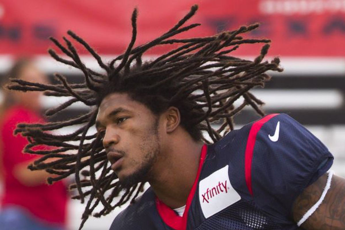 D. J. Swearinger runs out onto the field at training camp for the Houston Texans